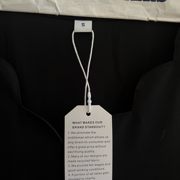 Black dress. new. size small. The waist has a see through pattern. - Picture 3 of 3